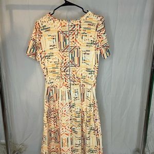Lularoe Cream/Orange Pattern Amelia XL